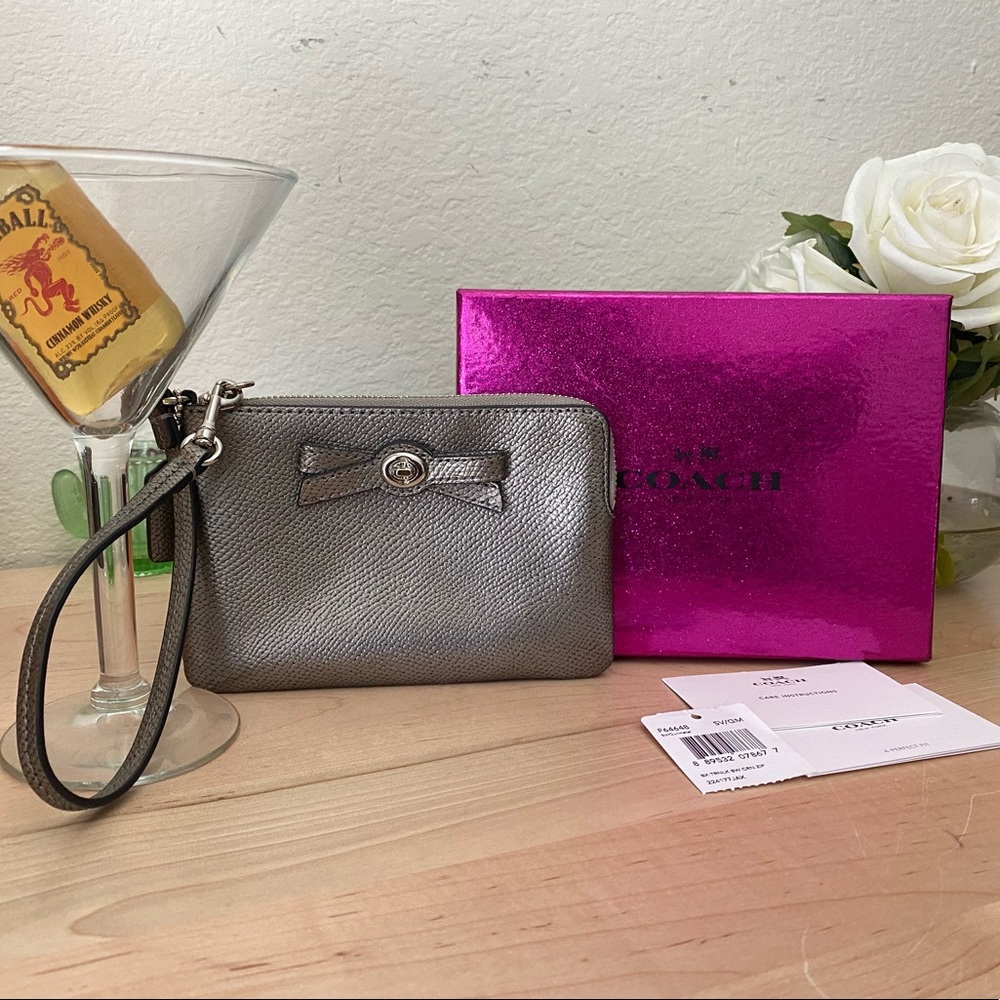 Sparkling gray Coach wristlet